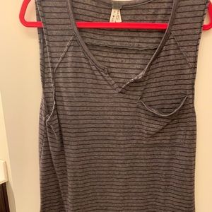 Free people tank.  Fits like a M/L